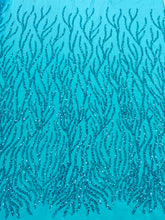 Dantela Couture türkiz gyöngyökkel és flitterekkel