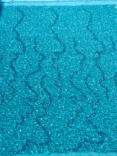 Dantela Couture türkiz általános mintával, gyöngyökkel és flitterekkel