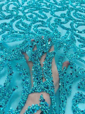 Dantela Couture türkiz geometriai mintával, gyöngyökkel és flitterekkel